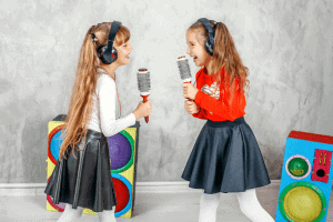 Have a concert or karaoke night as a fun creative activity for kids.